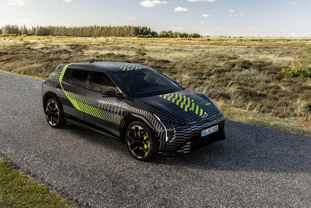 Neon Wrapped Kia EV4 GT Teases a Fierce & Electrified 2026 launch : Automotive Addicts Neon wrapped kia ev4 gt teases a fierce & electrified